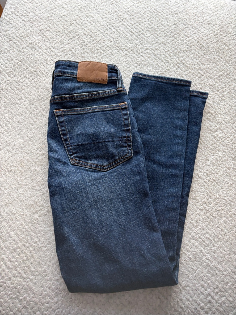 Aeropostale Slim Straight Jeans in Dark Blue with Brown Patch